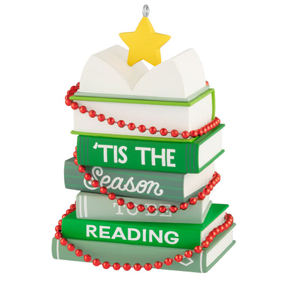 Light Holiday Reading — 2026 Hallmark Keepsake Christmas Ornament featuring stacked green books adorned with red garland and a star.