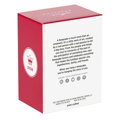 Light Holiday Reading — 2026 Hallmark Keepsake Christmas Ornament packaging detail with artist crafted text and festive design.