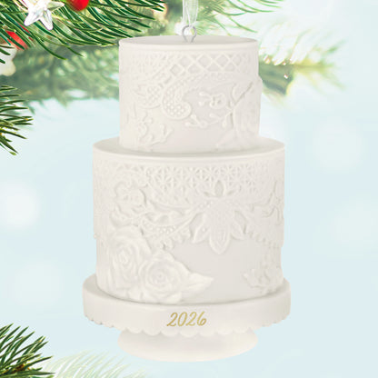 Wedding Cake 2026, Porcelain — 2026 Hallmark Keepsake Christmas Ornament featuring intricate lace detailing and floral designs, close up view.