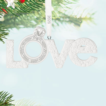 Our Engagement 2026, Porcelain — 2026 Hallmark Keepsake Christmas Ornament featuring textured floral 'Love' design and engagement ring detail.