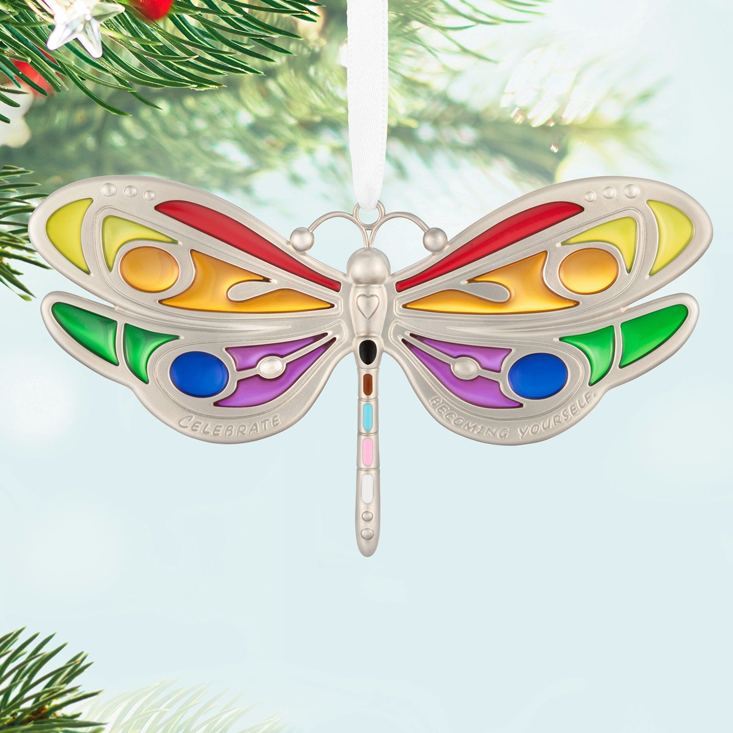 Celebrating You, Metal — 2026 Hallmark Keepsake Christmas Ornament in vibrant colours with a silver dragonfly design, hanging on a Christmas tree.