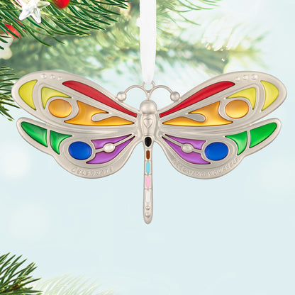Celebrating You, Metal — 2026 Hallmark Keepsake Christmas Ornament in vibrant colours with a silver dragonfly design, hanging on a Christmas tree.