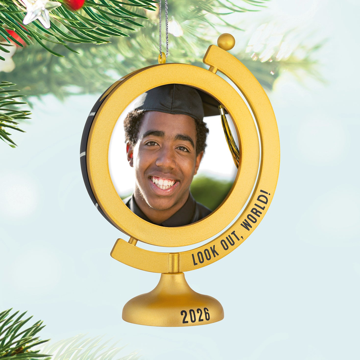 Look Out, World! 2026 photo frame — 2026 Hallmark Keepsake Christmas Ornament with gold globe design featuring a graduate's smiling photo.