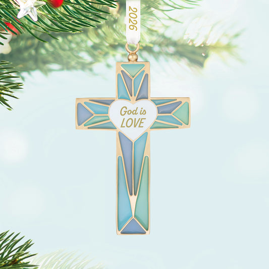 God is Love 2026, metal — 2026 Hallmark Keepsake Christmas Ornament with stained glass design, close-up view on tree.