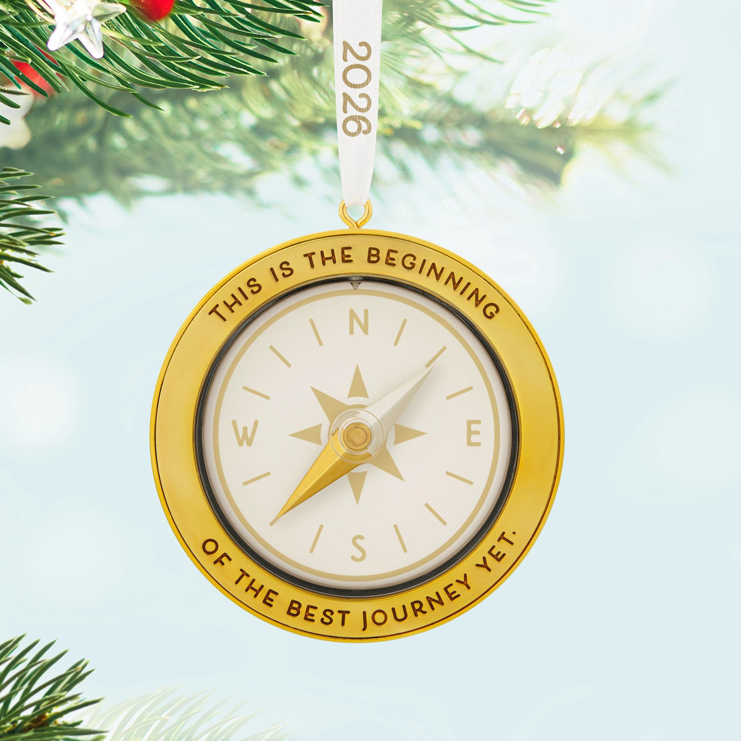 The Best Journey 2026, Metal — 2026 Hallmark Keepsake Christmas Ornament, gold compass design with inspirational message, close up.