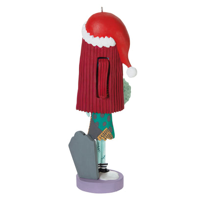 Disney Tim Burton's The Nightmare Before Christmas Festive Sally Nutcracker — 2026 Hallmark Keepsake Christmas Ornament, side view with detailed stitching and festive Santa hat.