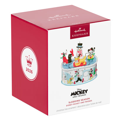 Disney Mickey and Friends Sledding Season Musical With Light and Motion — 2026 Hallmark Keepsake Christmas Ornament box packaging with festive design.