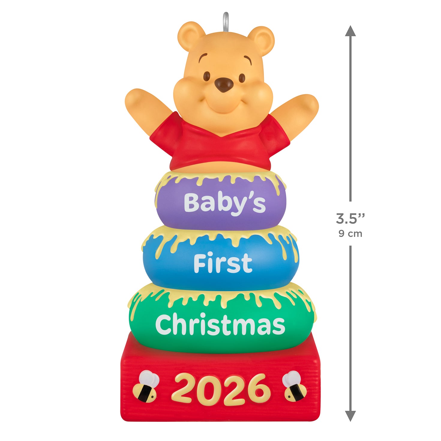 Disney Winnie the Pooh Baby's First Christmas 2026 — 2026 Hallmark Keepsake Christmas Ornament featuring Pooh atop colourful stacking rings with honey details, 9 cm tall.