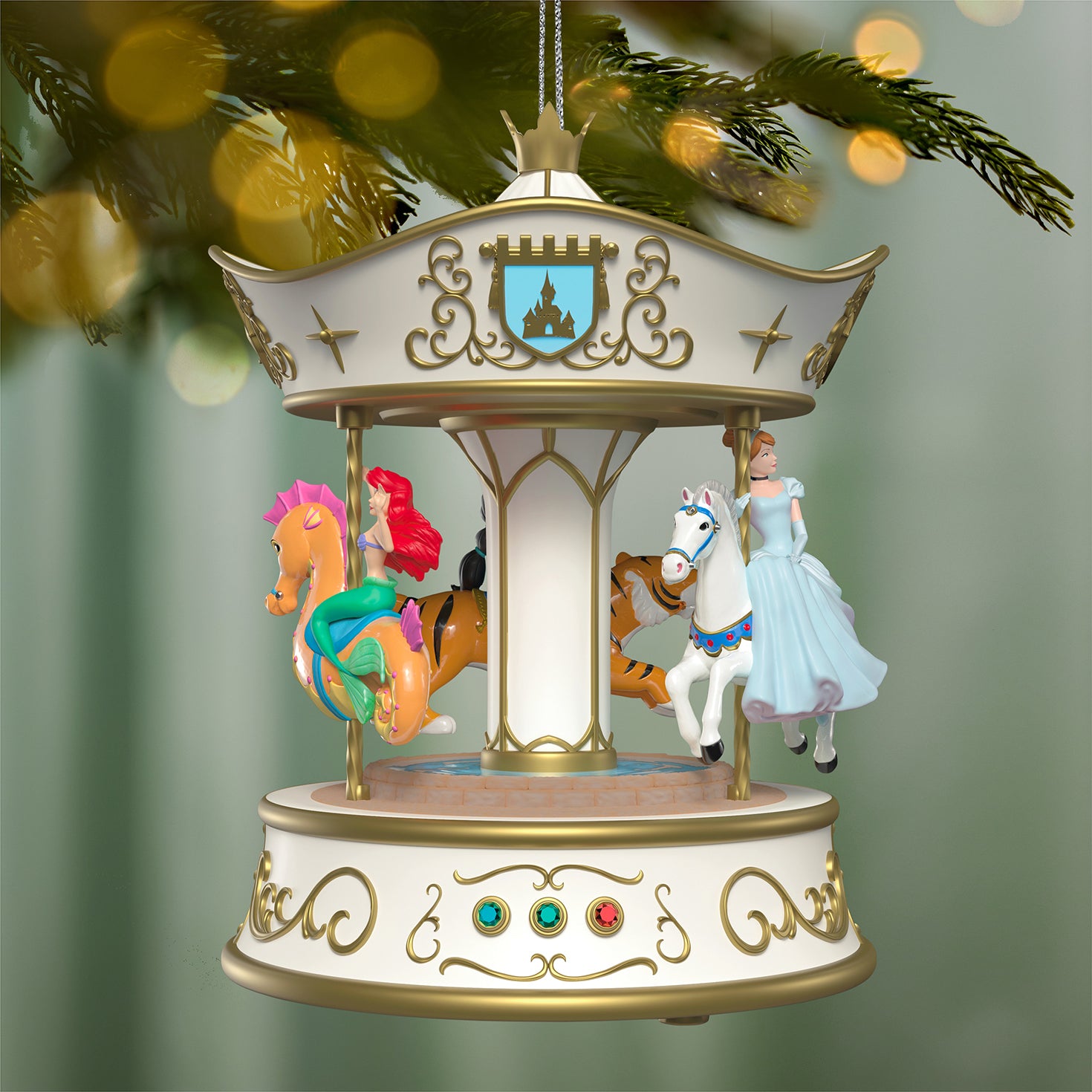Disney Princess Dreams Go Round Musical With Light and Motion — 2026 Hallmark Keepsake Christmas Ornament featuring Cinderella, Ariel and Jasmine on carousel horses, close up view.