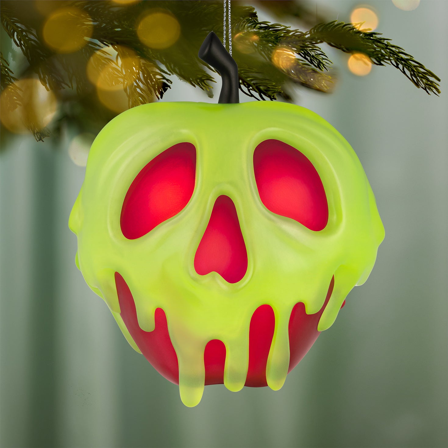 Disney Snow White and the Seven Dwarfs Just One Bite With Light — 2026 Hallmark Keepsake Christmas Ornament, eerie skull apple design with vibrant dripping detail.