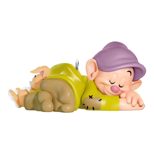Disney Snow White and the Seven Dwarfs Dozing Dopey — 2026 Hallmark Keepsake Christmas Ornament featuring Dopey sleeping with a bunny in a side view.