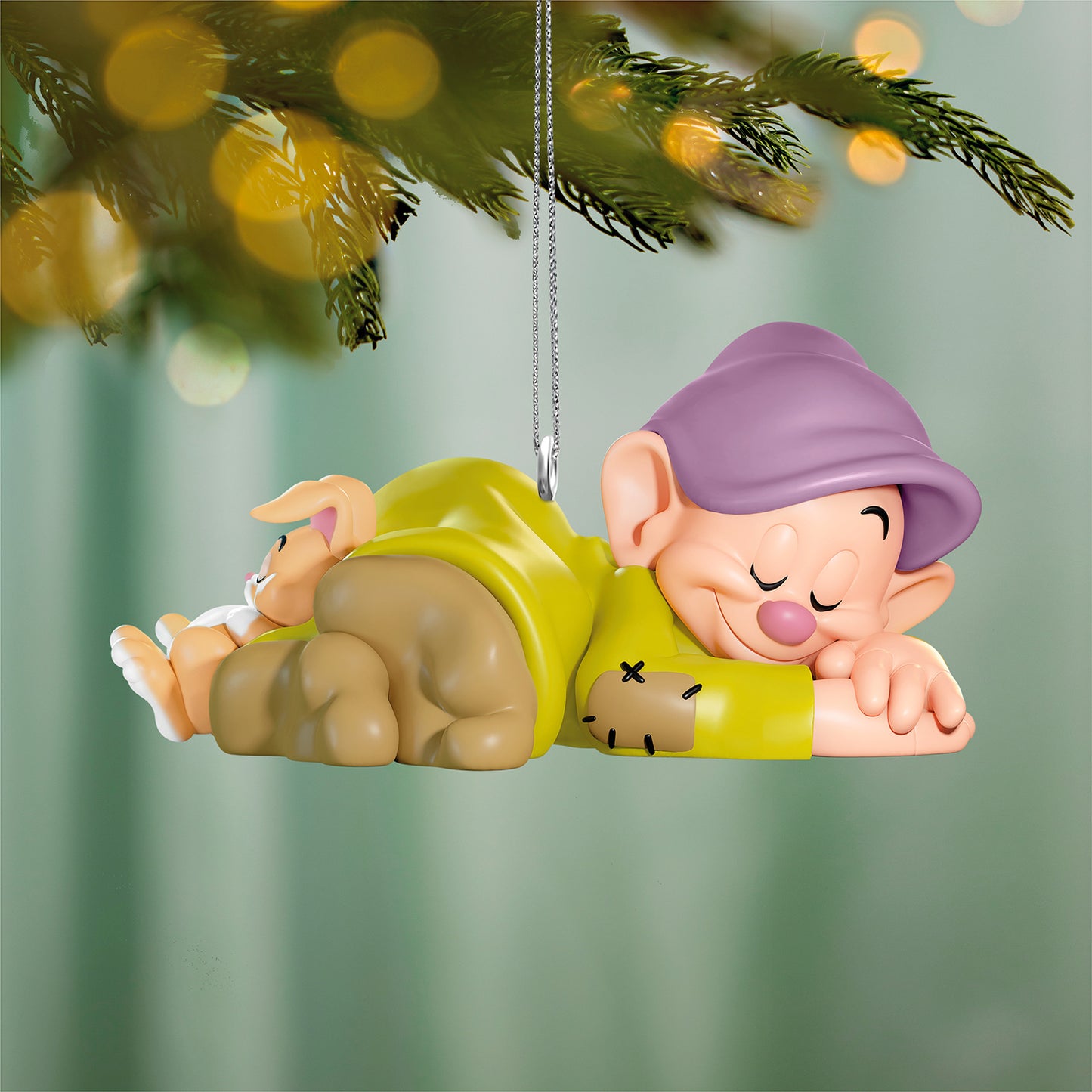 Disney Snow White and the Seven Dwarfs Dozing Dopey — 2026 Hallmark Keepsake Christmas Ornament, colourful design, close up of Dopey sleeping with a bunny.