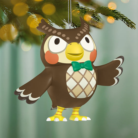 Nintendo Animal Crossing Blathers — 2026 Hallmark Keepsake Christmas Ornament, brown owl with green bow tie, close up on Christmas tree
