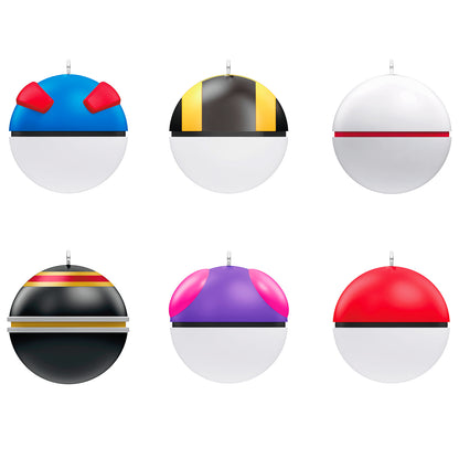 Pokémon Poké Ball, Set of 6 — 2026 Hallmark Keepsake Christmas Ornaments featuring six colourful designs, flat lay arrangement.