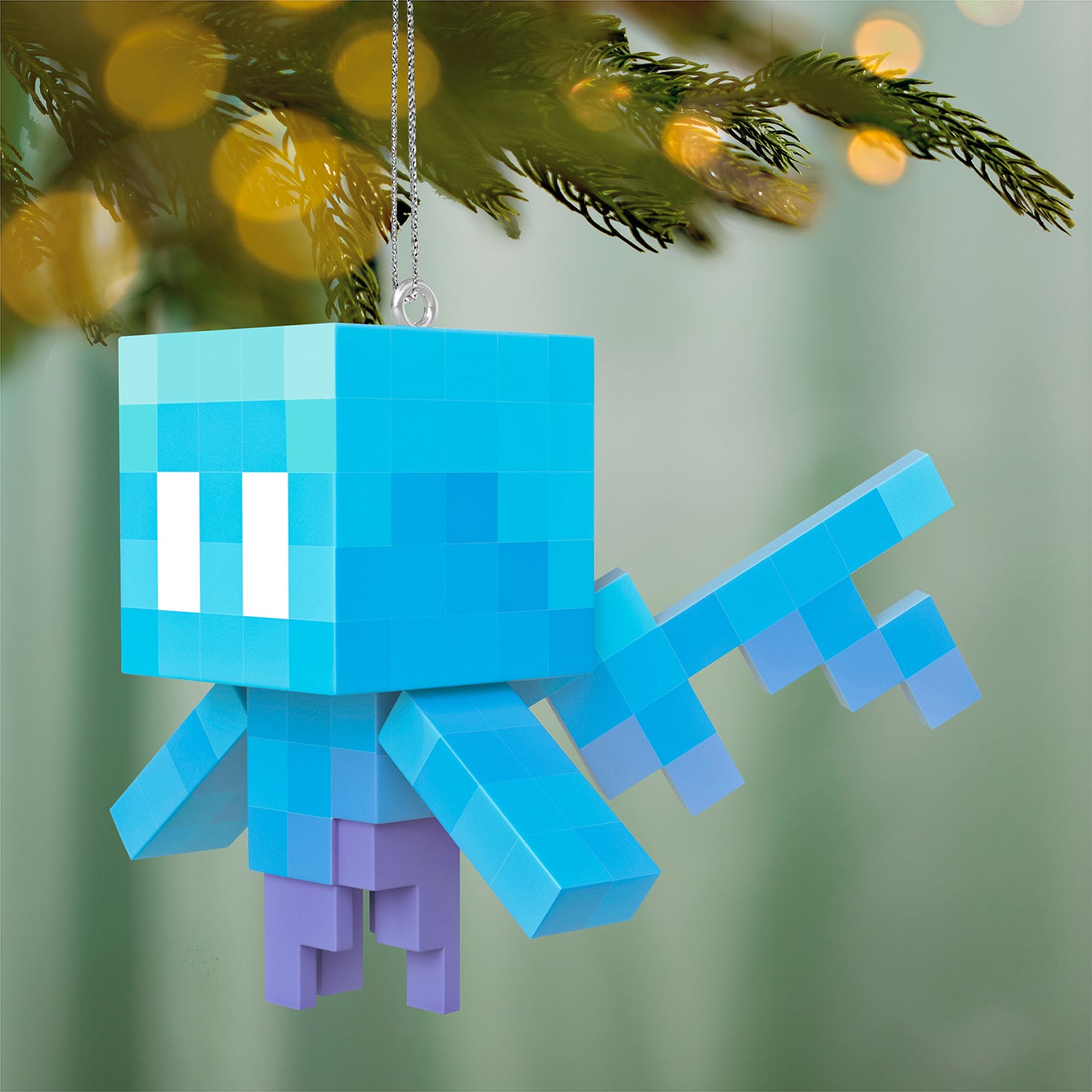 Minecraft Allay — 2026 Hallmark Keepsake Christmas Ornament, blue pixelated design, hanging from a tree branch with festive lights.