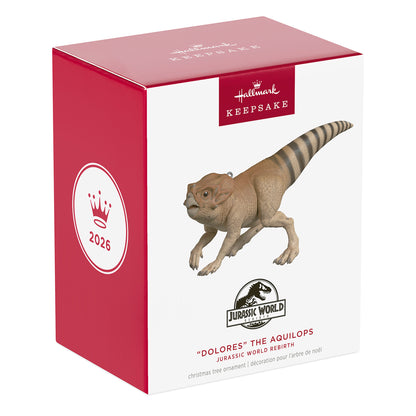 Jurassic World Rebirth "Dolores" the Aquilops — 2026 Hallmark Keepsake Christmas Ornament, box packaging with product details and dinosaur design.