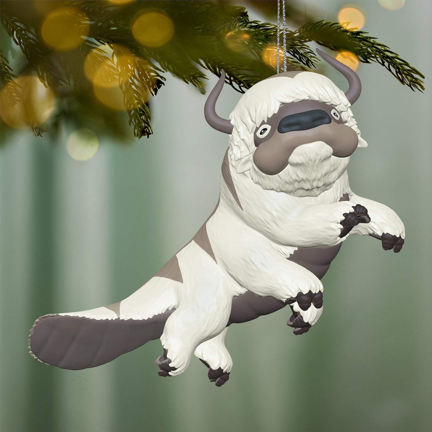 Avatar: The Last Airbender Aang's Loyal Appa — 2026 Hallmark Keepsake Christmas Ornament, detailed sky bison design, hanging from a Christmas tree branch.