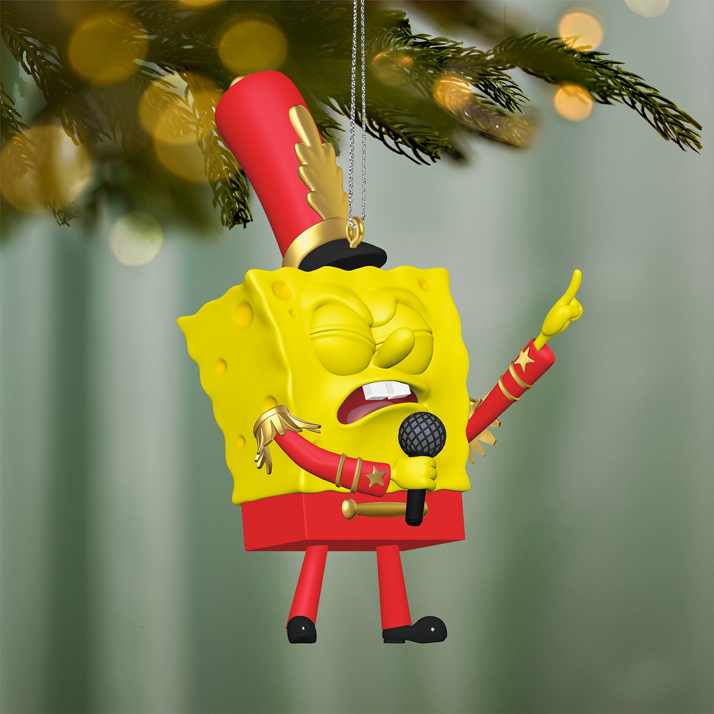 Nickelodeon SpongeBob SquarePants "Band Geeks" — 2026 Hallmark Keepsake Christmas Ornament in red marching band uniform, hanging on a Christmas tree.
