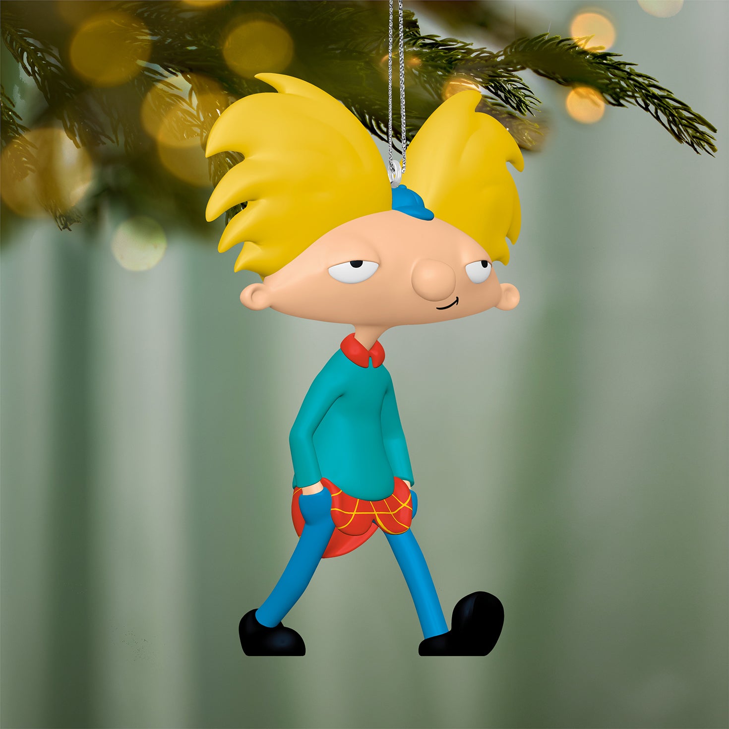 Nickelodeon Hey Arnold! Arnold Shortman — 2026 Hallmark Keepsake Christmas Ornament in teal sweater and red plaid detail, hanging on a tree.