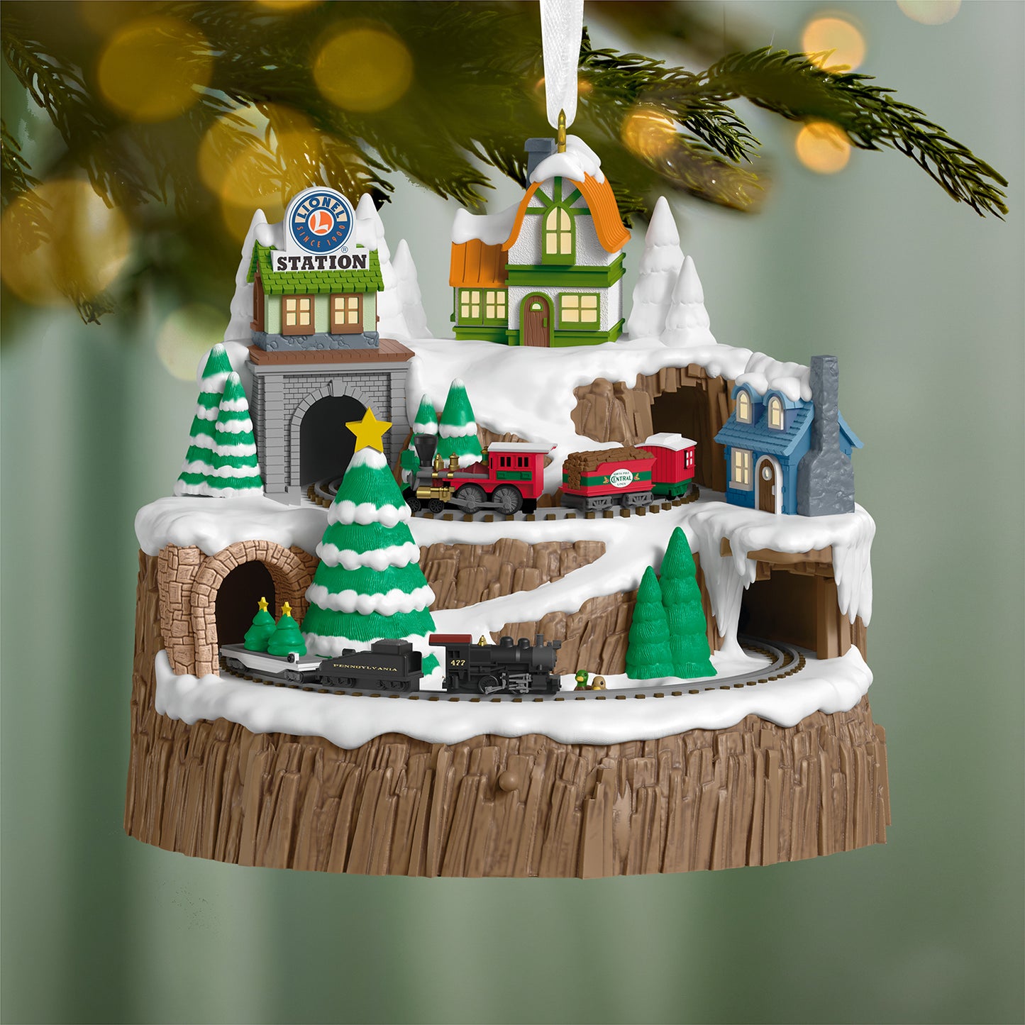 Lionel Christmas Mountain Musical With Light and Motion — 2026 Hallmark Keepsake Christmas Ornament with detailed snowy landscape and miniature train.