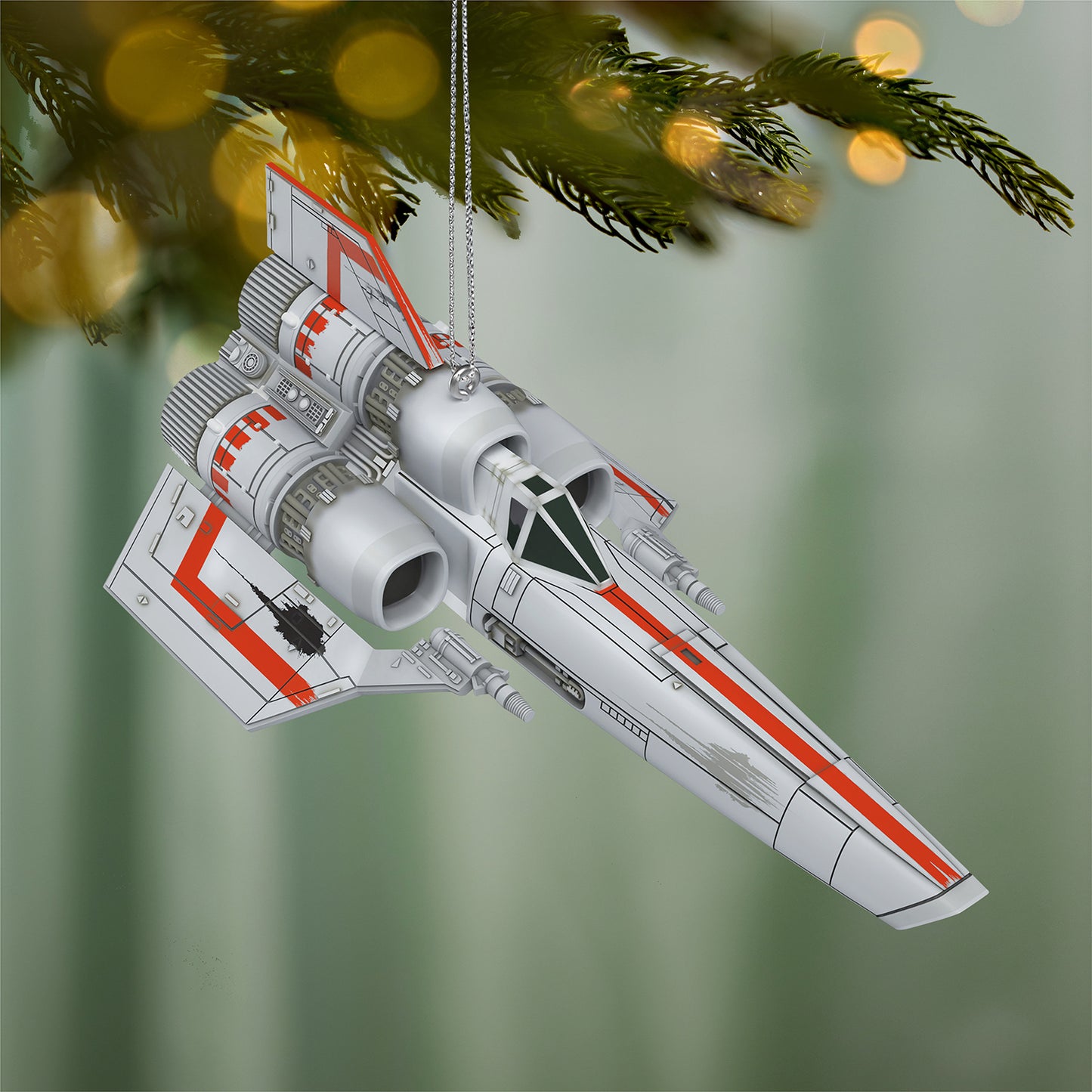 Battlestar Galactica Colonial Viper — 2026 Hallmark Keepsake Christmas Ornament featuring detailed design and hanging from a tree branch.