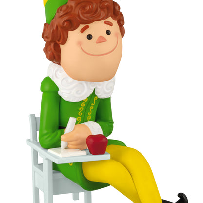 Elf Buddy the Elf — 2026 Hallmark Keepsake Christmas Ornament, vibrant design, sitting at a desk with an apple.