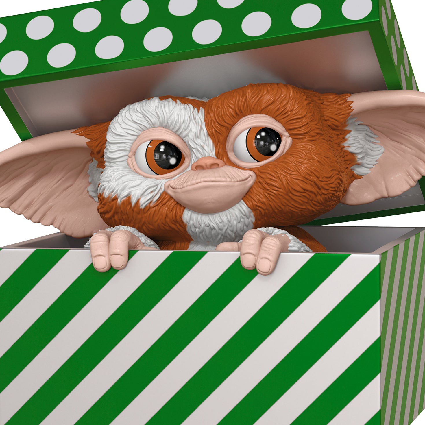 Gremlins Gizmo — 2026 Hallmark Keepsake Christmas Ornament, cute Mogwai figure peeking from festive package with green stripes.