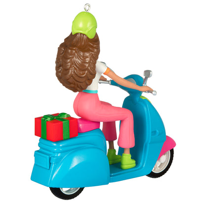 Barbie™ Fashionistas Doll and Scooter — 2026 Hallmark Keepsake Christmas Ornament showing a rear view with a green helmet and gift boxes.