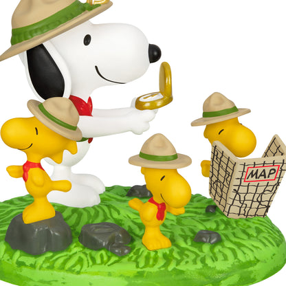 The Peanuts® Gang Orienteering — 2026 Hallmark Keepsake Christmas Ornament featuring Snoopy with a magnifying glass and Woodstock studying a map on grass.