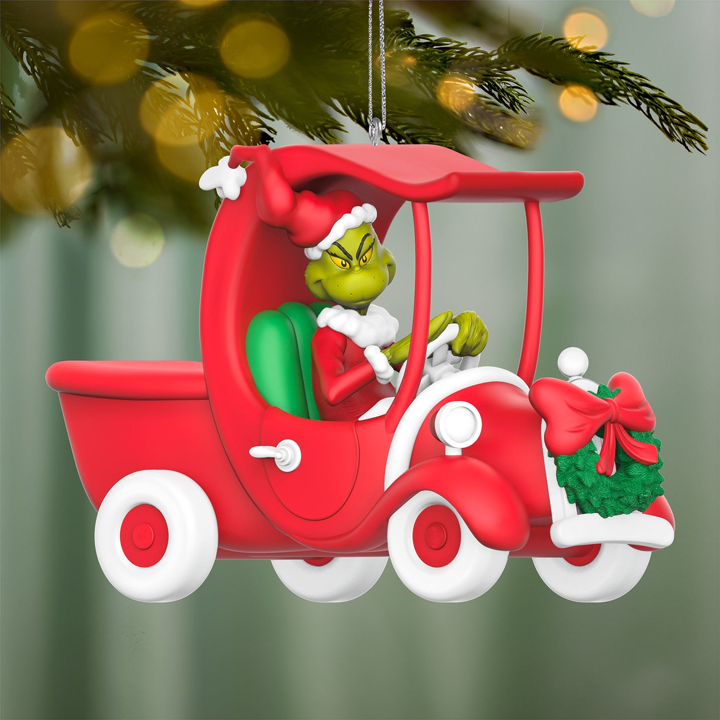 Dr. Seuss's How the Grinch Stole Christmas! A Grinchy Sleigh On the Way — 2026 Hallmark Keepsake Christmas Ornament in a red truck with a wreath.