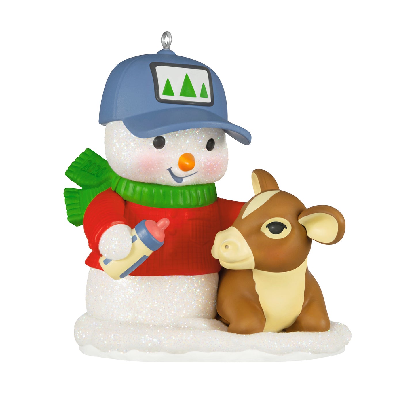 Snow Buddies, 29th in the Series — 2026 Hallmark Keepsake Christmas Ornament featuring a glittery snowman in red sweater and blue cap, feeding a calf.