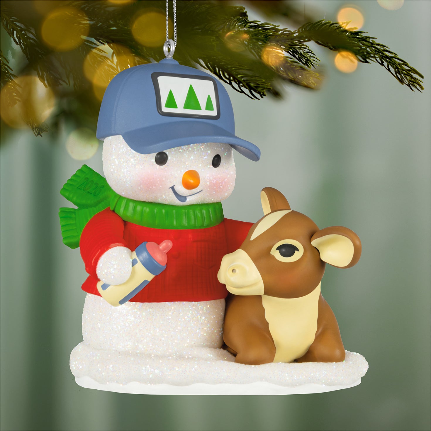 Snow Buddies, 29th in the Series — 2026 Hallmark Keepsake Christmas Ornament featuring a snowman in a red sweater with a calf.