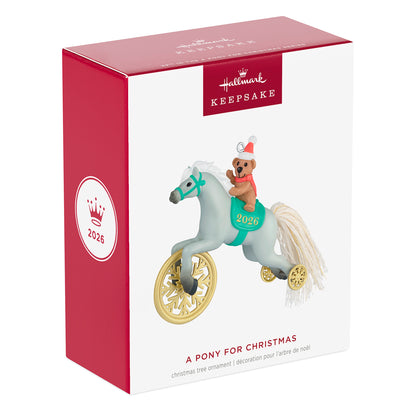 A Pony for Christmas, 29th in the Series — 2026 Hallmark Keepsake Christmas Ornament in gift box packaging with gold wheels.