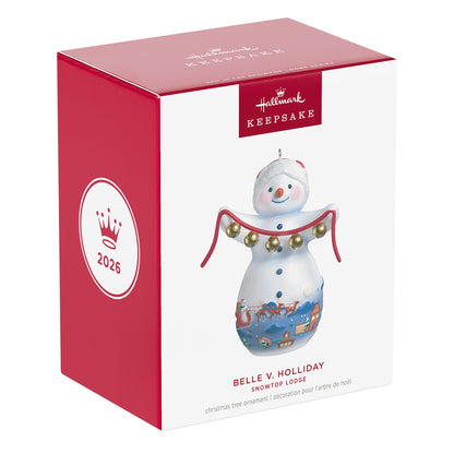 Snowtop Lodge Belle V. Holliday, porcelain Christmas ornament in festive packaging, featuring a smiling snowman and shiny gold bells.