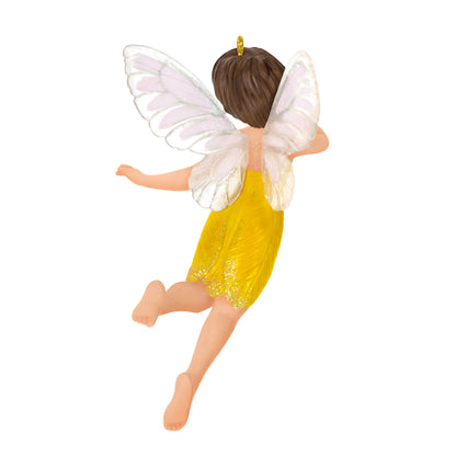 Fairy Messengers Crocus Fairy, 22nd in the Series — 2026 Hallmark Keepsake Christmas Ornament showing back view with sparkly wings and yellow dress.