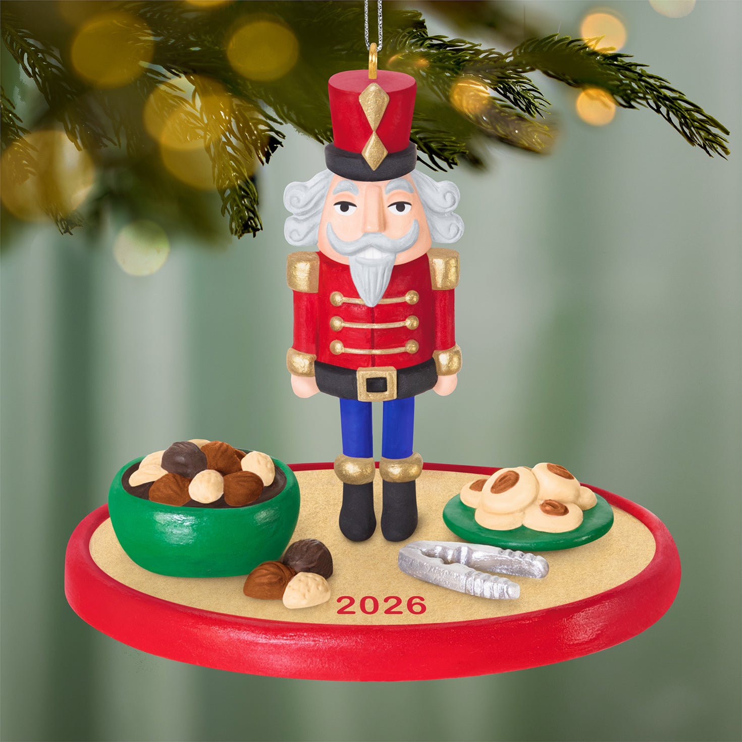 Season's Treatings 2026, 18th in the Series — 2026 Hallmark Keepsake Christmas Ornament featuring a nutcracker soldier on a platter with treats.