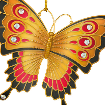 Brilliant Butterflies, 10th in the Series — 2026 Hallmark Keepsake Christmas Ornament with vibrant gold, red and black wings and gemstone accents, close up view.