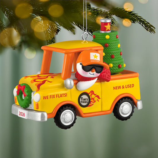 Holiday Parade 2026, 8th in the Series — 2026 Hallmark Keepsake Christmas Ornament featuring a snowman in a vibrant yellow pickup truck with a Christmas tree.