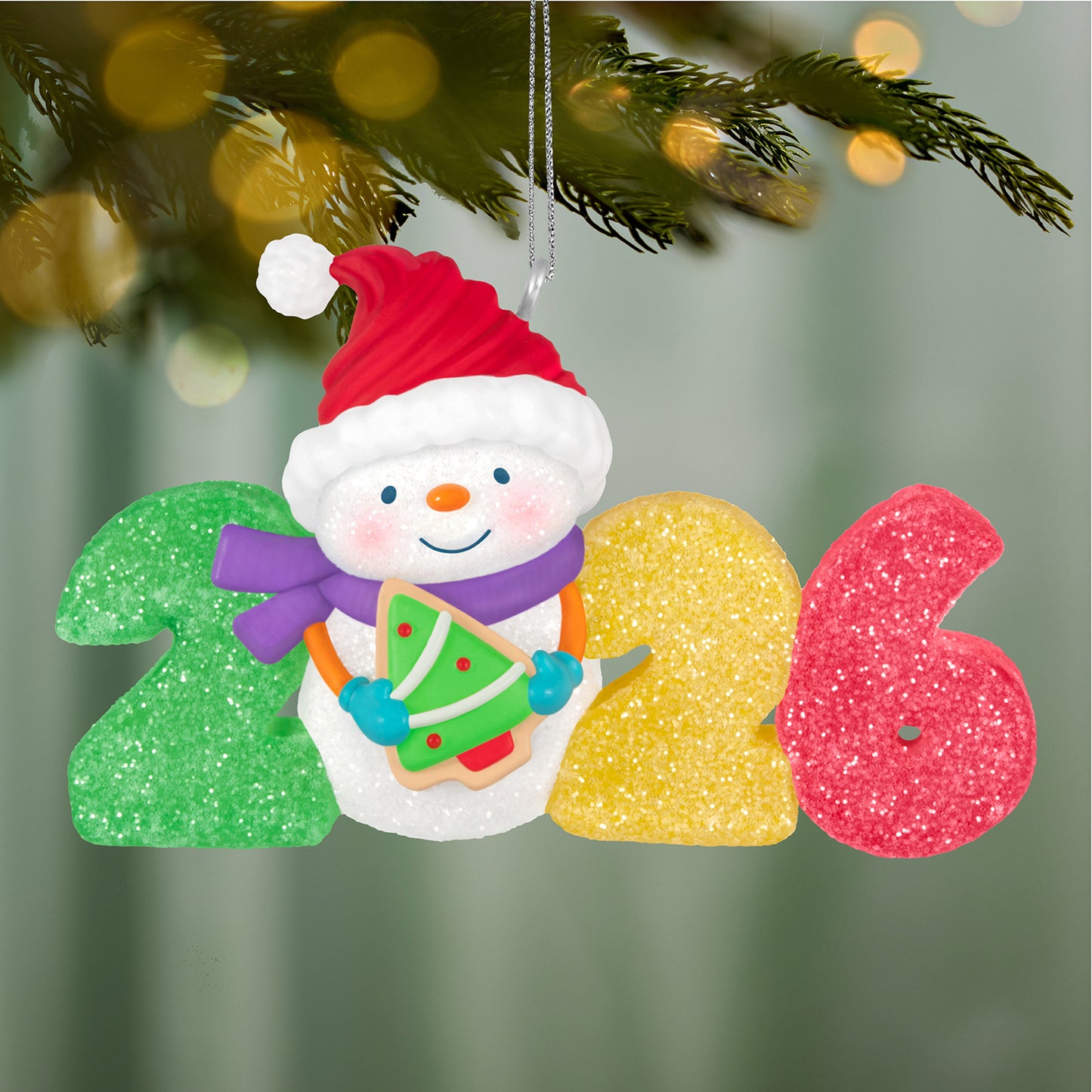 Sweet Decade 2026, 7th in the Series — 2026 Hallmark Keepsake Christmas Ornament featuring a cheerful snowman holding a tree cookie with glittery 2026 numbers.