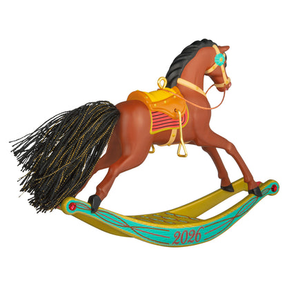 Rocking Horse Memories 2026, 7th in the Series — 2026 Hallmark Keepsake Christmas Ornament, detailed rocking horse with golden brown coat and colourful saddle.