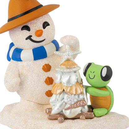 Sandal the Sandman, 5th in the Series — 2026 Hallmark Keepsake Christmas Ornament features a glittery snowman and sea turtle building a seashell Christmas tree.