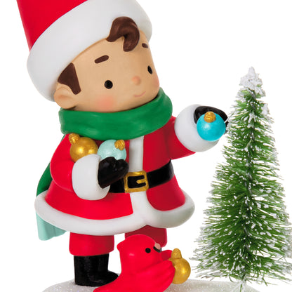 Young Santa, 5th in the Series — 2026 Hallmark Keepsake Christmas Ornament, cute figurine with ornaments and bottlebrush tree, close up view