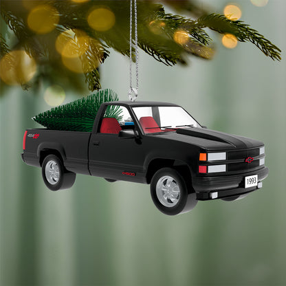 All-American Trucks 1993 Chevrolet® 454 SS 2026, metal, black with red interior and bottlebrush tree attachment, hanging on a Christmas tree.