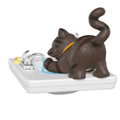 Mischievous Kittens, 28th in the Series — 2026 Hallmark Keepsake Christmas Ornament featuring a playful brown cat near a sink with water.