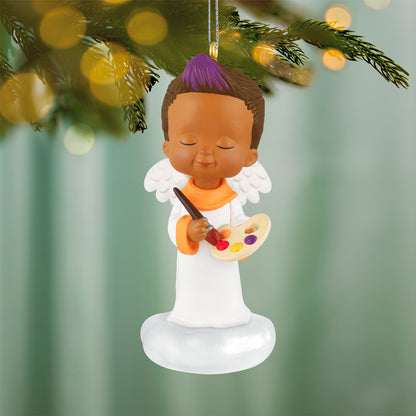 Mary's Angels Lupine, 39th in the Series — 2026 Hallmark Keepsake Christmas Ornament, showing a smiling angel with a palette on a cloud.