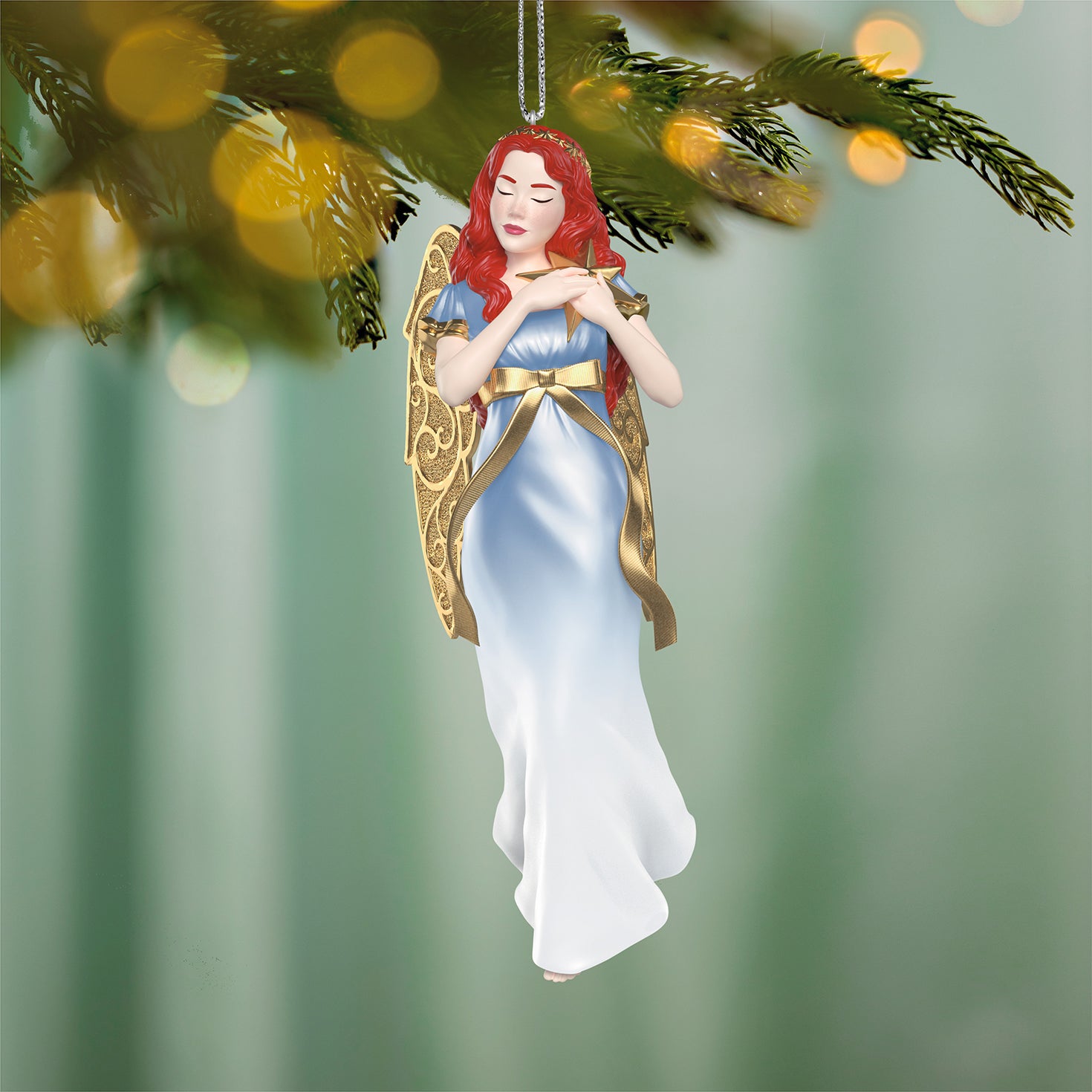 Christmas Angels Guidance, 9th in the Series — 2026 Hallmark Keepsake Christmas Ornament, pale blue dress, detailed gold wings, hanging from a tree