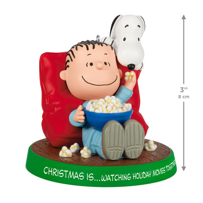 The Peanuts® Gang Christmas Is...Watching Holiday Movies Together, 3rd in the Series — 2026 Hallmark Keepsake Christmas Ornament with Linus and Snoopy enjoying popcorn.