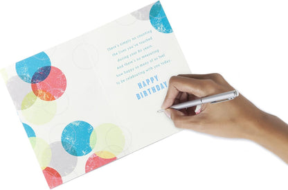 Hallmark 80th birthday greeting card (Color Orbs) with colourful circles, featuring handwritten message on the inside.