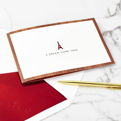 Hallmark Signature Paper Wonder Wood Pop Up Anniversary Card, romantic birthday card with Eiffel Tower design and foil lettering, flat lay view.