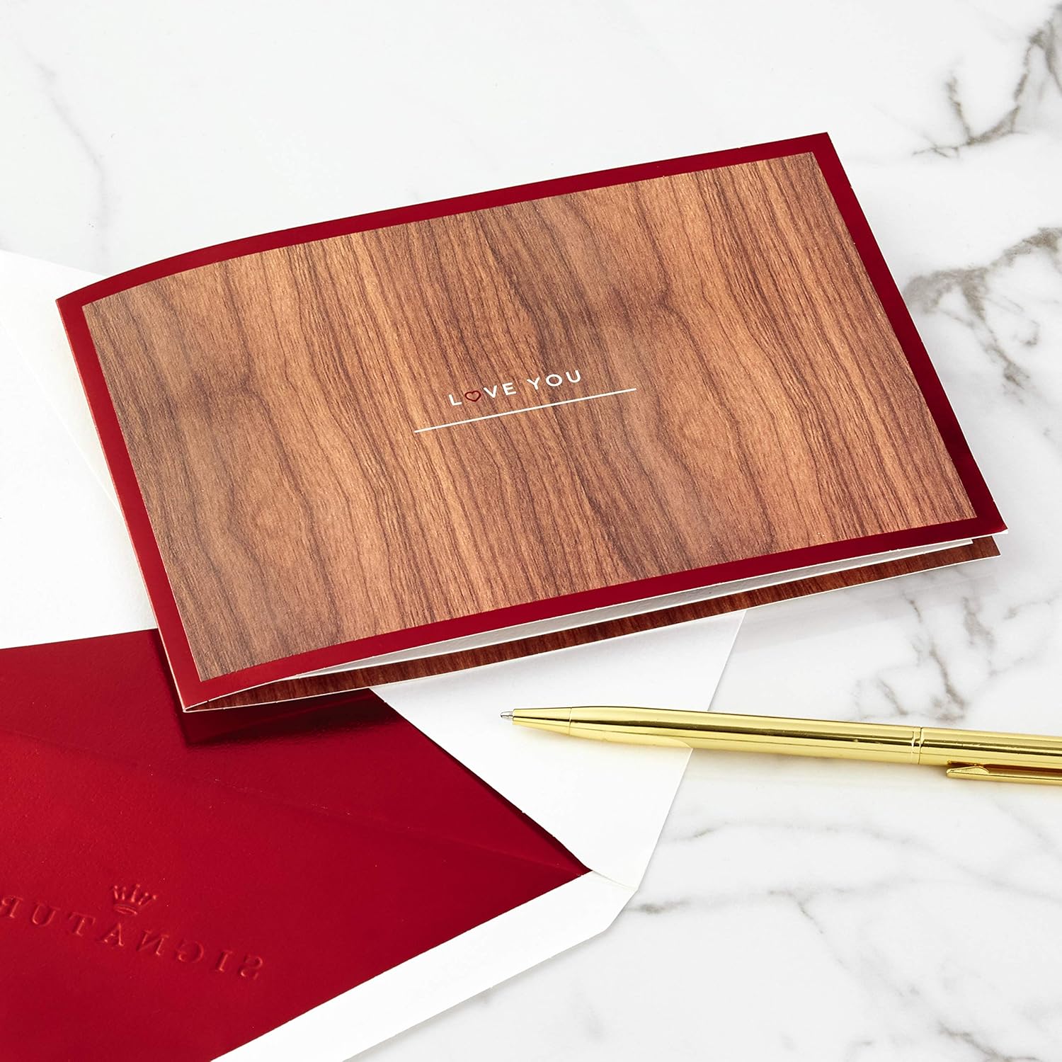 Hallmark Signature Paper Wonder Wood Pop Up Anniversary Card, romantic birthday card, love card (tree) on marble surface with pen.